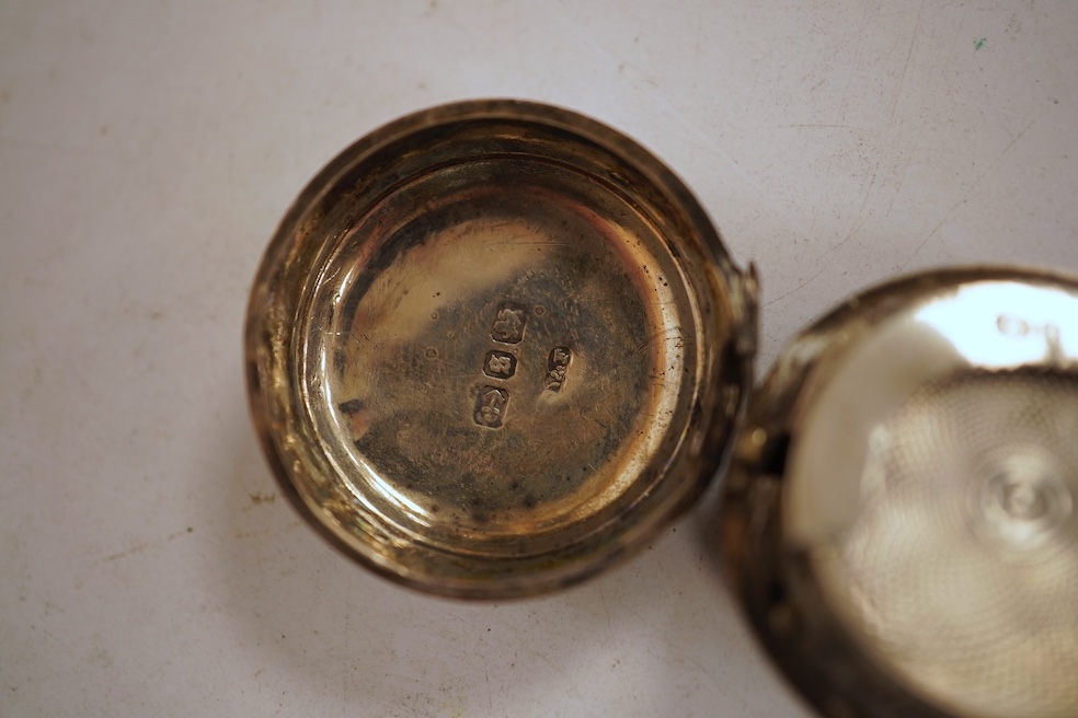 A white metal hunter keywind pocket watch, with Roman dial and subsidiary seconds, two silver charm bracelets and sundry items including jewellery and a silver sovereign case.